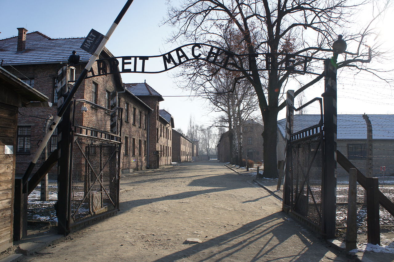 1280px-Auschwitz-Work_Set_Free-new.jpeg